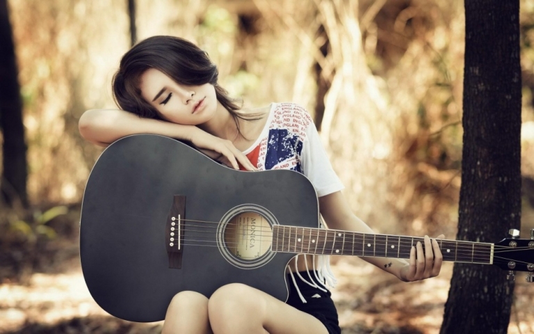 Chơi guitar là một dạng thưởng thức nghệ thuật cổ điển