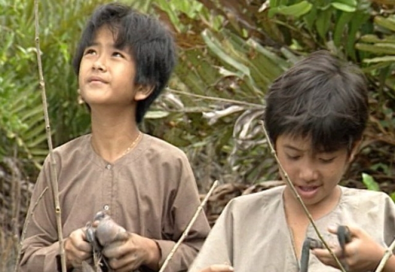 Bé An và thằng Cò (Phùng Ngọc) trong một cảnh quay